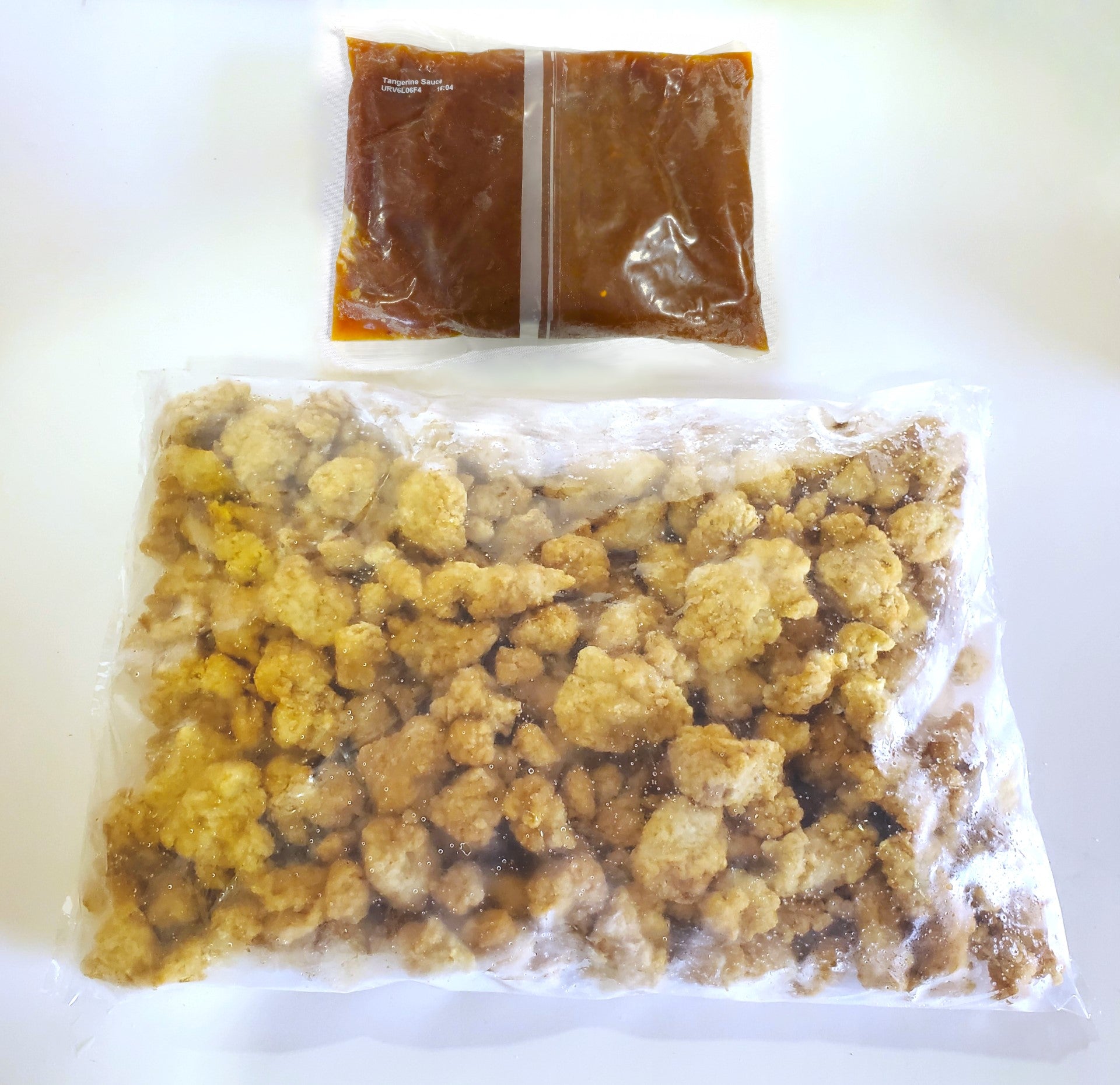 Green Dragon Battered Tangerine Chicken Nuggets Whole Grain 7.15 Pound Each - 6 Per Case.