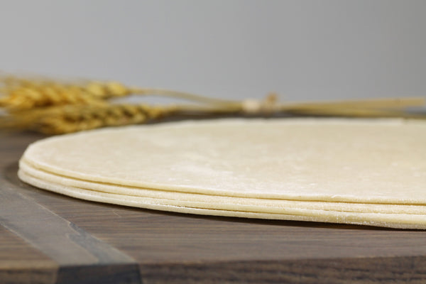 12" Original Thin Crust Round Par Baked Pizza Shell Flat Bread 5 Ounce Size - 50 Per Case.