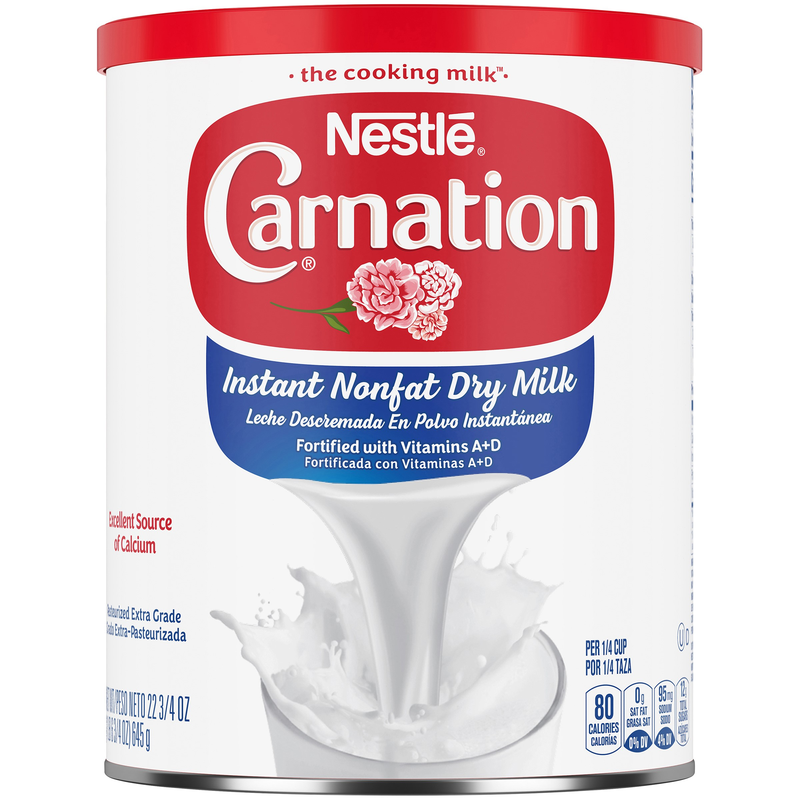 Nestle Carnation Instant Nonfat Dry Milk Canister Tray 22.75 Ounce Size - 4 Per Case.