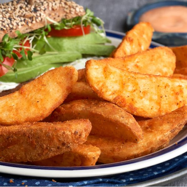 Super Wedge Cut Original Recipe Frozen Potatoes 5 Pound Each - 6 Per Case.