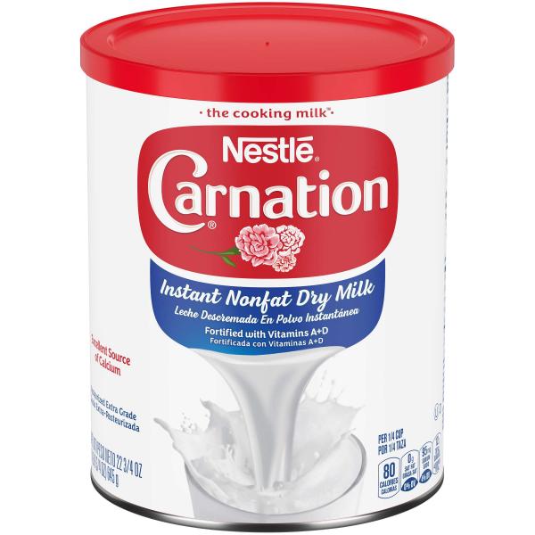 Nestle Carnation Instant Nonfat Dry Milk Canister Tray 22.75 Ounce Size - 4 Per Case.
